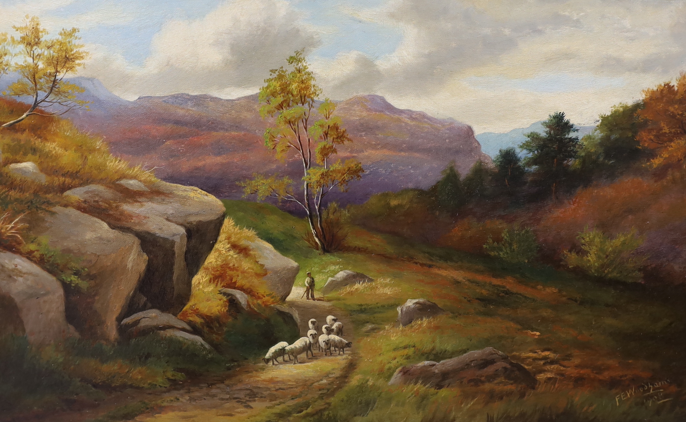 F. E. Woodbarns (19th / 20th. C), pair of oils on canvas, Autumn landscapes with shepherd and sheep, signed and dated 1908, each 54cm x 34cm, ornate gilt frames